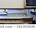 3D printer in the middle of printing 142303646
