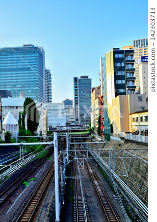 View of the JR Meguro Station area from Shirokane Sandobashi Bridge in Shinagawa Ward, Tokyo. View of the JR Meguro Station area from Shirokane Sandobashi Bridge in Shinagawa Ward, Tokyo. 142303713