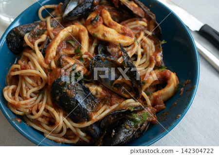 Seafood spaghetti pasta with mussels and squid Seafood spaghetti pasta with mussels and squid 142304722