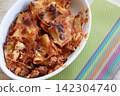 Baked pasta dish with cheese tomato sauce 142304740