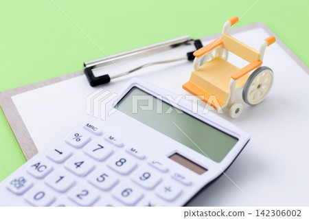 Wheelchair and calculator Wheelchair and calculator 142306002