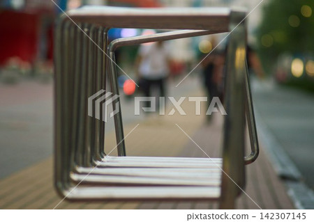 Modern Stainless Steel Bicycle Rack Framing City Alley Perspective Modern Stainless Steel Bicycle Rack Framing City Alley Perspective 142307145