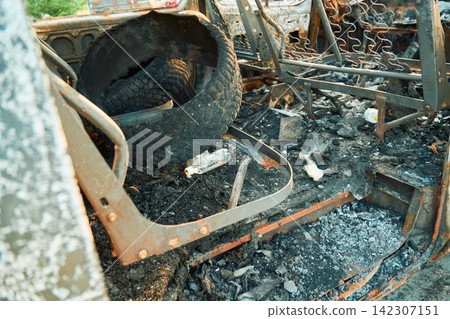 Charred Car Interior Inside Burned Delivery Van with Metal Seat Frames Charred Car Interior Inside Burned Delivery Van with Metal Seat Frames 142307151