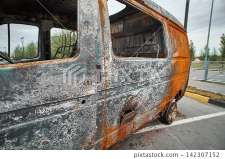 Melted Plastic and Burned Trash on a Charred Vehicle Floor Melted Plastic and Burned Trash on a Charred Vehicle Floor 142307152