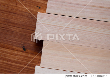 Simple background with wood grain and wooden planks. Simple background with wood grain and wooden planks. 142308056
