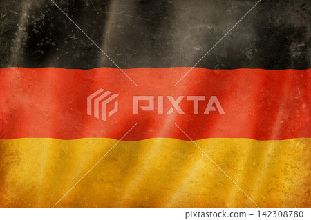 Old vintage flag of Germany, worn and stained Old vintage flag of Germany, worn and stained 142308780