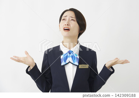 Middle-aged female staff member gives up (white background) Middle-aged female staff member gives up (white background) 142309188