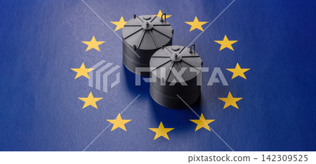 Liquefied gas storage tanks set against the EU flag as a background for your design Liquefied gas storage tanks set against the EU flag as a background for your design 142309525