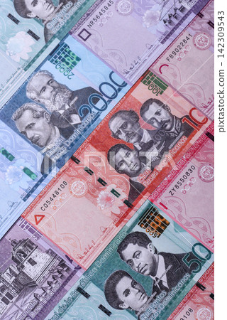 Dominican peso banknotes and coins as a instrument of trade and exchange. Dominican peso Dominican peso banknotes and coins as a instrument of trade and exchange. Dominican peso 142309543