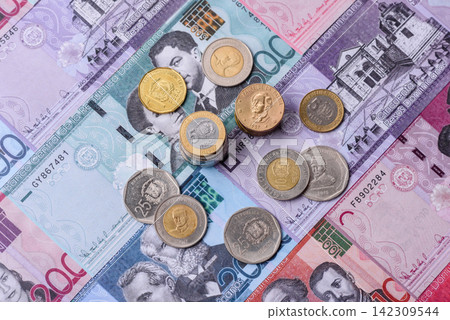 Dominican peso banknotes and coins as a instrument of trade and exchange. Dominican peso Dominican peso banknotes and coins as a instrument of trade and exchange. Dominican peso 142309544