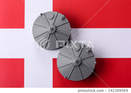 Liquefied gas storage tanks set against the Danish money as a background for your design Liquefied gas storage tanks set against the Danish money as a background for your design 142309569