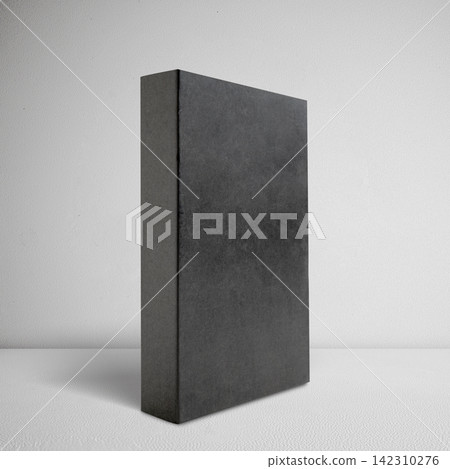 Blank black book or box mockup standing upright on a white surface against a textured background. Mockup or Copyspace Blank black book or box mockup standing upright on a white surface against a textured background. Mockup or Copyspace 142310276