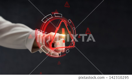 Businesswoman pointing at a glowing red warning triangle icon on a digital interface, symbolizing cybersecurity alert, system error, or risk management on a dark background. Cyber threat concept Businesswoman pointing at a glowing red warning triangle icon on a digital interface, symbolizing cybersecurity alert, system error, or risk management on a dark background. Cyber threat concept 142310295