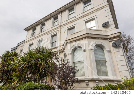 Classic British style apartment building exterior Classic British style apartment building exterior 142310465