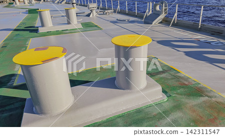 Close up view of yellow steel double bitt mooring bollard on ship deck with blue sea water in background during calm sunny day horizontal stock photo Close up view of yellow steel double bitt mooring bollard on ship deck with blue sea water in background during calm sunny day horizontal stock photo 142311547