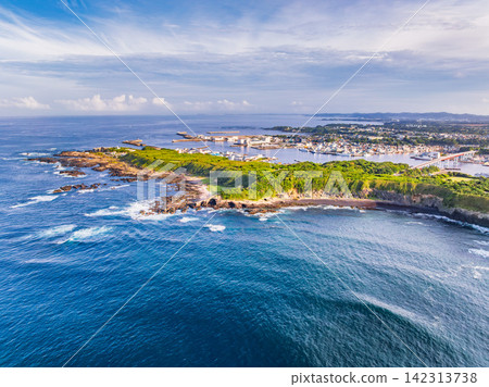 A clear summer morning, aerial photograph taken from 145m above the coast of Jogashima Island, showing Jogashima Island, Jogashima Bridge, the Miura Peninsula, and Enoshima Island. A clear summer morning, aerial photograph taken from 145m above the coast of Jogashima Island, showing Jogashima Island, Jogashima Bridge, the Miura Peninsula, and Enoshima Island. 142313738