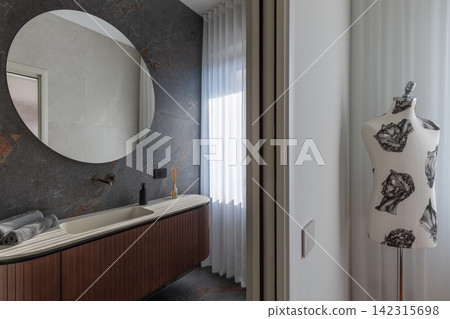 Bathroom interior composed around a decorative dress form with clear geometry Bathroom interior composed around a decorative dress form with clear geometry 142315698