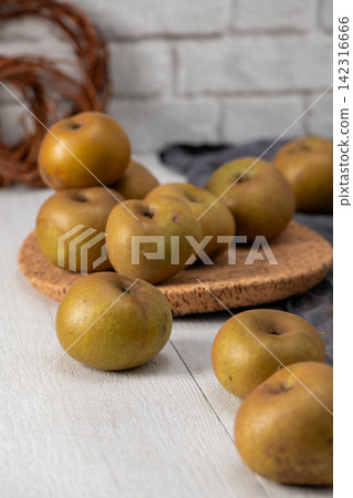 Rustic harvest of speckled apples Rustic harvest of speckled apples 142316666