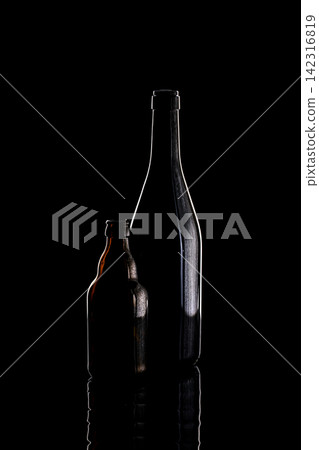 Still life with glass objects on a black background Still life with glass objects on a black background 142316819