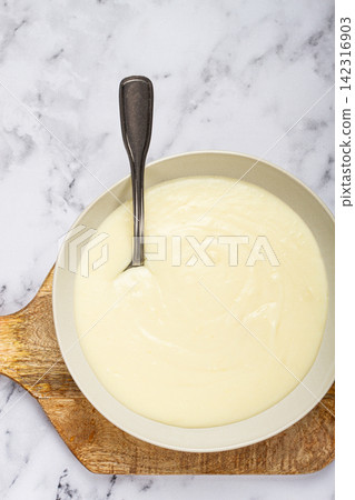 Mashed potatoes, with suluguni cheese, homemade, on a marble table, no people, top view, 142316903