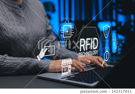 RFID Radio Frequency Identification Concept. Person using laptop with RFID technology, secure contactless systems, retail automation, data tracking, smart retail, inventory management, access systems, RFID Radio Frequency Identification Concept. Person using laptop with RFID technology, secure contactless systems, retail automation, data tracking, smart retail, inventory management, access systems, 142317651