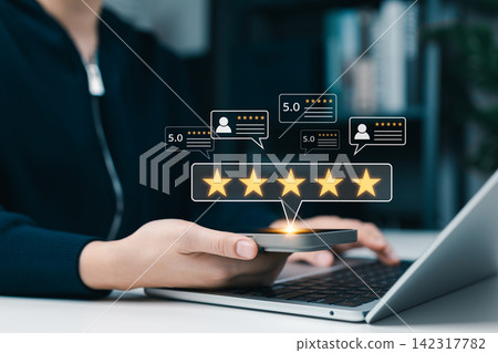 Customer satisfaction concept with five star rating on smartphone, online review feedback, user testimonials and reputation management for business service quality and digital marketing strategy. Customer satisfaction concept with five star rating on smartphone, online review feedback, user testimonials and reputation management for business service quality and digital marketing strategy. 142317782