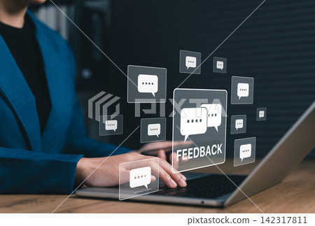 Customer feedback and online communication concept. Businesswoman using laptop managing user comments and digital feedback messages with chat icon, customer experience, engagement, service improvement Customer feedback and online communication concept. Businesswoman using laptop managing user comments and digital feedback messages with chat icon, customer experience, engagement, service improvement 142317811