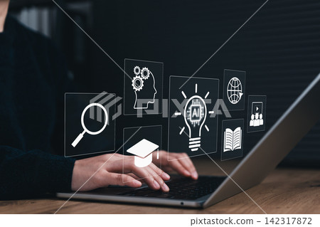 AI Learning and Smart Education Concept. Person using laptop with icons for graduation, global access, digital content, AI tools, online learning, smart education, interactive knowledge discovery AI Learning and Smart Education Concept. Person using laptop with icons for graduation, global access, digital content, AI tools, online learning, smart education, interactive knowledge discovery 142317872