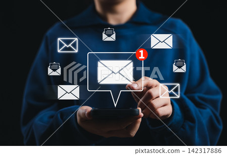 Email marketing and communication concept. Woman using smartphone with digital mail notification and envelope icon around screen for business newsletter, inbox messaging, online contact, phishing mail Email marketing and communication concept. Woman using smartphone with digital mail notification and envelope icon around screen for business newsletter, inbox messaging, online contact, phishing mail 142317886