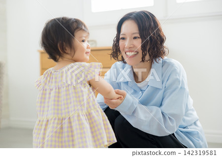 Mothers watching over children Mothers watching over children 142319581