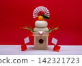 A photo of a real rice cake, "Kagami-mochi," in the center, on a red and white background, with a sanpo (pedestal) 142321723