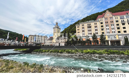 Rosa Khutor resort village with mountain river in Sochi Rosa Khutor resort village with mountain river in Sochi 142321755