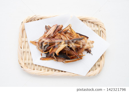 Thickly shaved bonito flakes placed on a sieve Thickly shaved bonito flakes placed on a sieve 142321796