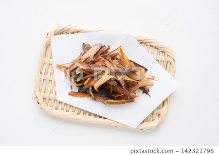 Thickly shaved bonito flakes placed on a sieve Thickly shaved bonito flakes placed on a sieve 142321798