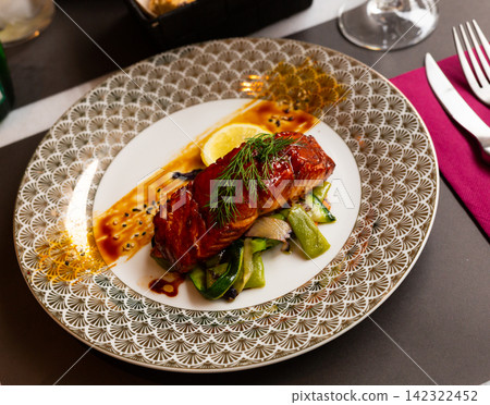 Salmon in soy-honey sauce with fried vegetables Salmon in soy-honey sauce with fried vegetables 142322452