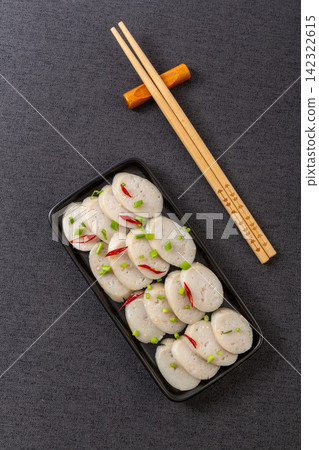 cooked flying fish roe chicken sausages on wooden cutting board cooked flying fish roe chicken sausages on wooden cutting board 142322615