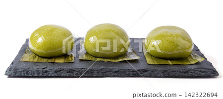chinese Qingming festival mugwort green rice dumplings with chocolate paste filling chinese Qingming festival mugwort green rice dumplings with chocolate paste filling 142322694