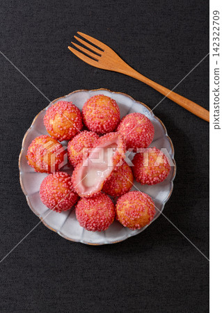 pink coconut flavor lava puffs with molten liquid cream center 142322709