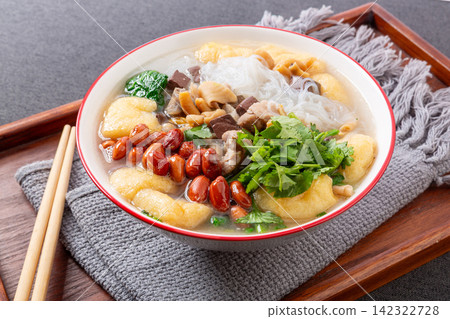 traditional Chinese duck blood soup with rice vermicelli tofu puffs and cilantro traditional Chinese duck blood soup with rice vermicelli tofu puffs and cilantro 142322728