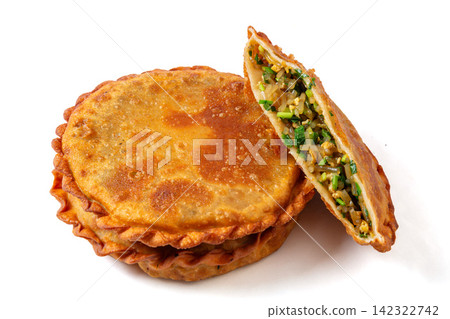 pan fried round flatbread pie stuffed with Chinese chives and egg pan fried round flatbread pie stuffed with Chinese chives and egg 142322742