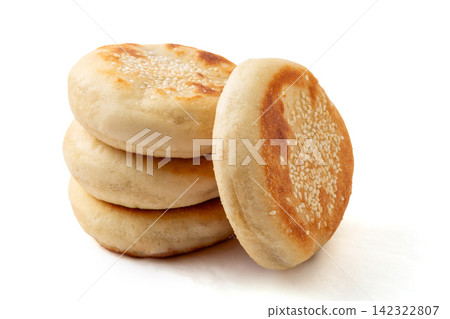 pan fried sweet red bean paste stuffed pastry topped with white sesame pan fried sweet red bean paste stuffed pastry topped with white sesame 142322807