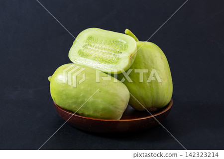 fresh Whole and Cut Light Green Apple Cucumber Isolated on White fresh Whole and Cut Light Green Apple Cucumber Isolated on White 142323214