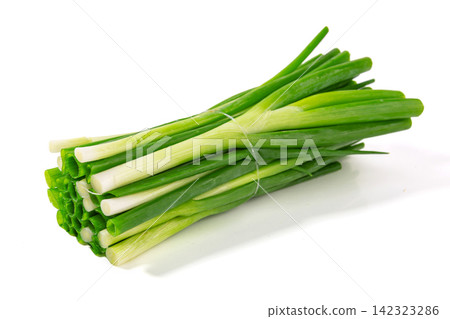 fresh Green Spring Onions Scallions Close-up on White Background 142323286
