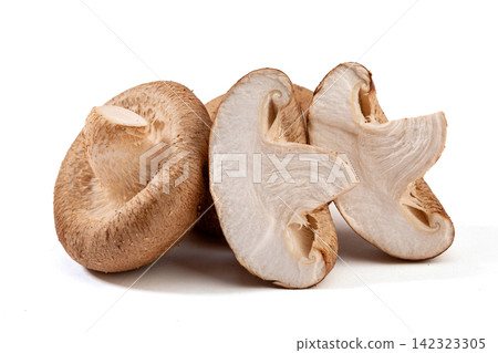whole Raw Shiitake Mushroom Caps Close Up whole Raw Shiitake Mushroom Caps Close Up 142323305