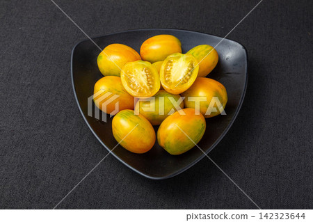 whole and Cut Tiger Stripe Tomatoes whole and Cut Tiger Stripe Tomatoes 142323644