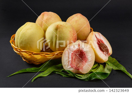 whole and Sliced Juicy Honey Peaches whole and Sliced Juicy Honey Peaches 142323649