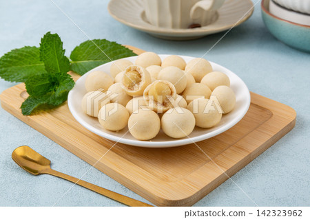wasabi Coated Roasted Macadamia Nuts Heap wasabi Coated Roasted Macadamia Nuts Heap 142323962