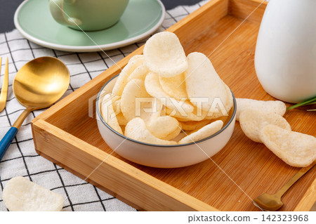 heap of Truffle Seasoned Puffed Shrimp Chips heap of Truffle Seasoned Puffed Shrimp Chips 142323968
