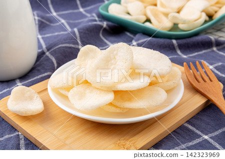 heap of Truffle Seasoned Puffed Shrimp Chips heap of Truffle Seasoned Puffed Shrimp Chips 142323969