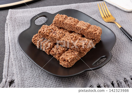 row of High Protein Oat Chocolate Energy Bars row of High Protein Oat Chocolate Energy Bars 142323986